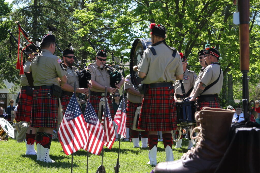 Tripoli Scottish Highlanders performing in formal tartan dress